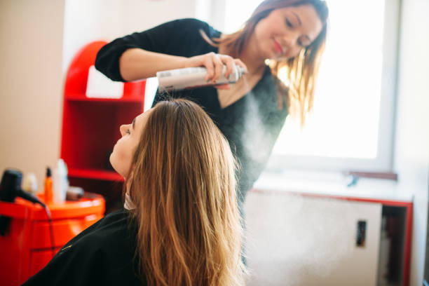 Woman working in a salon exposed to chemicals