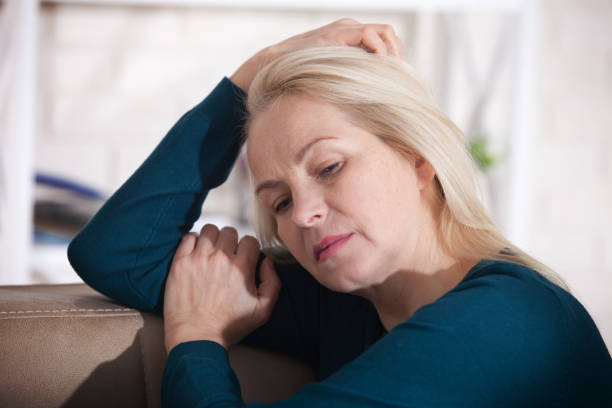 Woman in her 40s noticing changes in muscle tone during perimenopause