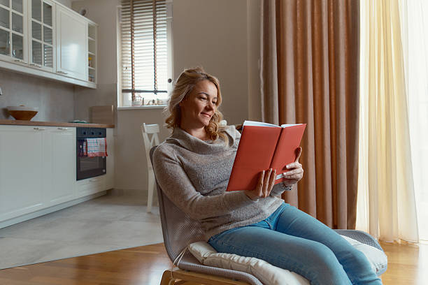 Woman in her 40s reading about estrogen and metabolism changes