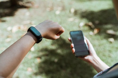 Person reviewing metabolic health insights on wearable dashboard