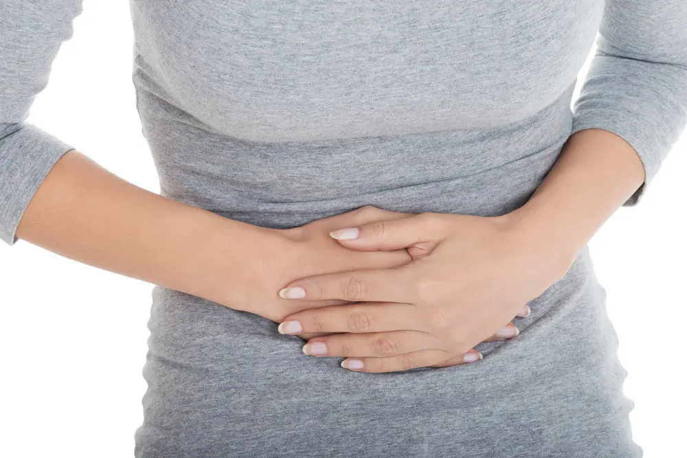 Woman experiencing severe abdominal bloating